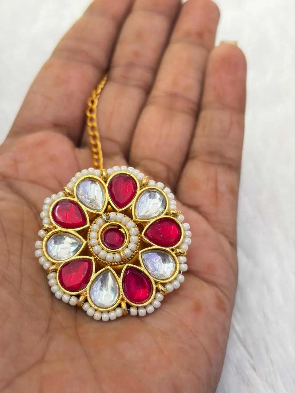 JB85.1 Beautiful White Pink Kundan Floral Rakhdi Big - Image 1